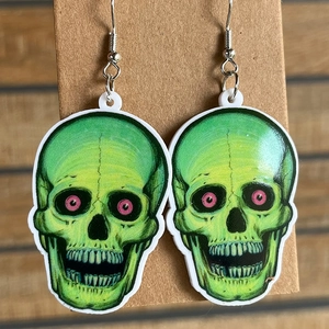 Halloween skeleton skull drop earrings in fluorescent green and pink acrylic design