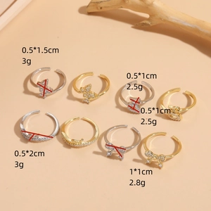 Zircon butterfly open rings in 14K gold plated finish with geometric crystal accents