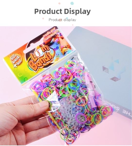 Macro view of DIY loom bands kit with 600 colorful rubber bands and weaving tools