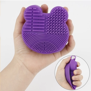 Purple bear-shaped silicone makeup brush cleaner with diverse textures and sponge