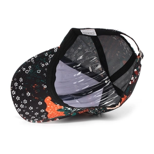 Detail view of ethnic floral baseball cap interior with breathable mesh and metal buckle