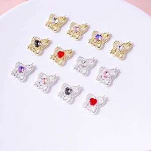 Star-ring heart charms for nail art in gold and silver finish with colorful rhinestones