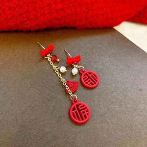 Chinese New Year asymmetric red tassel earrings with Fu character and ribbon bow