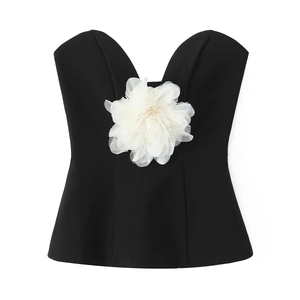 Minimalist black strapless tube top featuring a large 3D white mesh flower decoration