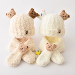 Close-up of soft fleece baby winter set with bear ears hat and matching scarf