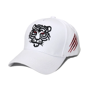 White street style baseball cap with tiger head embroidery and red scratch detail