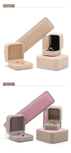 Detail view of velvet jewelry boxes showing interior slots for rings and necklaces