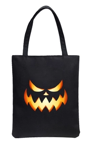 Halloween tote bag with glowing pumpkin face 2D print on black canvas material