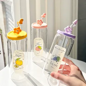 Three aesthetic glass cups with colorful floral straws and fruit labels on a sunlit window