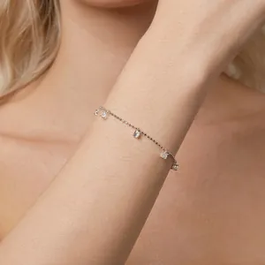 Minimalist S925 sterling silver beaded bracelet with five sparkling zircon drop pendants
