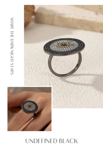 Detail of S925 silver luxury dark style ring with blue and white zircon starburst pattern