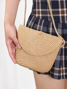 Handmade woven straw shell crossbody bag for women with spiral texture for summer beach