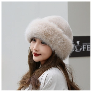 Detailed close-up showing the soft beige faux fur texture of this stylish winter beret hat