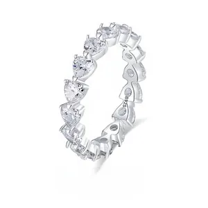 Detailed macro of S925 sterling silver eternity band featuring heart-shaped stones