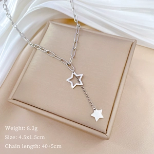 Silver star pendant chain necklace on jewelry box with product size and weight specs