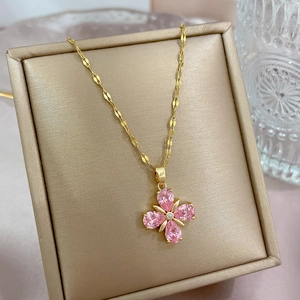 Elegant gold titanium steel clover necklace with pink gemstone and small diamond