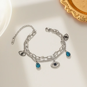 Bracelet double couche Evil Eye en argent avec pendentif goutte bleue et cristaux