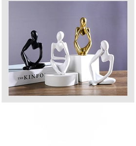 Set of abstract thinker resin sculptures in gold black and white for modern home decor