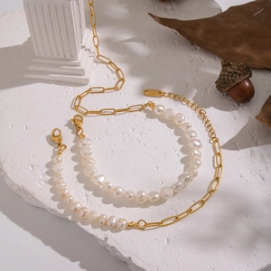 French vintage stainless steel necklace with natural freshwater pearls on a stone base