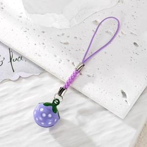 Purple polka dot fruit bell charm with hand-woven lanyard for bags and cell phones