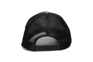 Adjustable plastic snapback closure and breathable mesh detail on a black trucker cap
