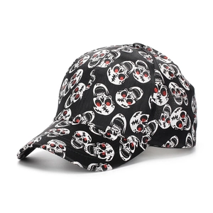 Black punk baseball cap with all-over skull print and red sequin eye details