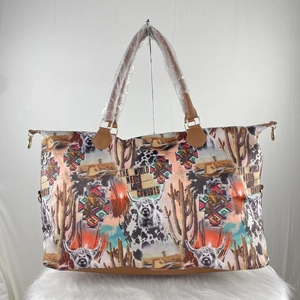 Western canvas weekender bag with cowgirl and cactus prints and brown leather trim