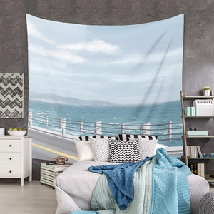 Detailed texture of bohemian seaside landscape tapestry hanging in a minimalist bedroom