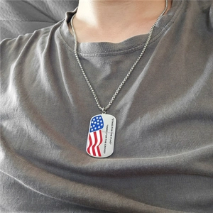 Silver stainless steel necklace with US flag heart pendant and patriotic engraving