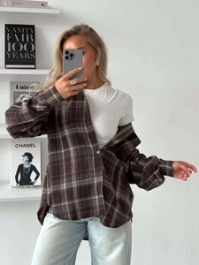Women's plaid button-down shirt in dark coffee color styled with white t-shirt and jeans