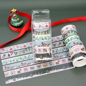 Detail of 6-roll Christmas washi tape set featuring reindeer and snowflake patterns