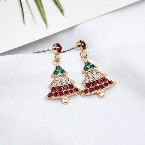 Sparkling S925 silver Christmas tree studs with colorful rhinestones on white fabric