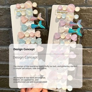 Close-up of macaron hair clips with seashell and starfish shapes on display cards