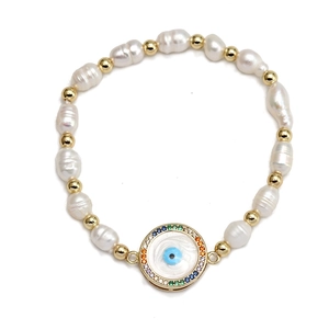 Beaded bracelet with freshwater pearls, gold beads, and a colorful Evil Eye charm