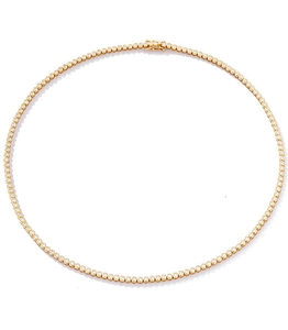 Detail of gold bubble tennis necklace with 2mm round moissanite in circular layout