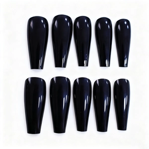 Glossy black long coffin press on nails in a mirror finish set displayed on white background