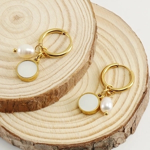 French retro gold hoop earrings featuring white enamel and freshwater pearl charms