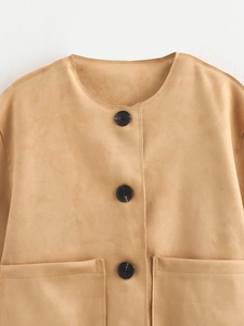 Close-up of camel faux suede jacket featuring black buttons and large patch pockets