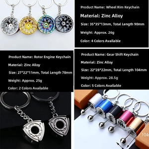 Car parts keychain detail showing wheel hub, rotor engine, and gear shifter specs
