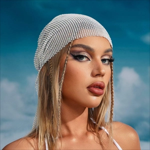 Close-up detail of silver sparkling rhinestone mesh bandana for music festival and party