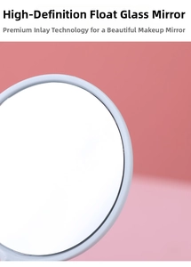 Close-up of portable round hand mirror with HD float glass and white minimalist frame