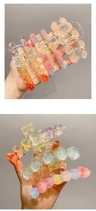 Detail of gradient heart and butterfly claw clips made of high-quality acrylic resin
