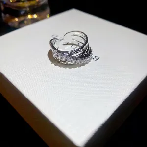 Three-layer crisscross zircon open ring in silver finish for a luxurious look