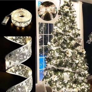 Silver LED Christmas ribbon light string with warm glow for tree and holiday decoration