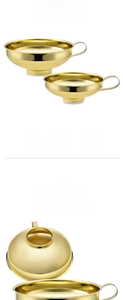 Macro view of golden stainless steel funnels with wide mouth and silicone protective base