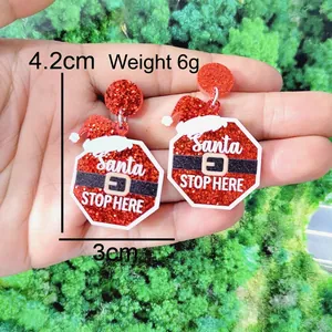 Glittery red Santa outfit acrylic earrings with size and weight detail dimensions