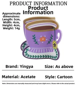 Detail shot of a purple coffee cup hair claw clip made of acetate with dimensions 5x4x4cm