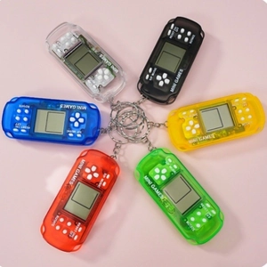 Mini Tetris game console keychains in multiple colors on a soft pink background