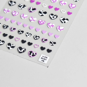 3D heart nail stickers with magenta cow print and embossed texture for DIY art