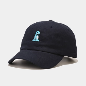 Close-up of navy blue cotton baseball cap featuring light blue dinosaur embroidery detail